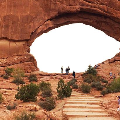 Hikers exploring scenic trails in Moab's red rock landscape